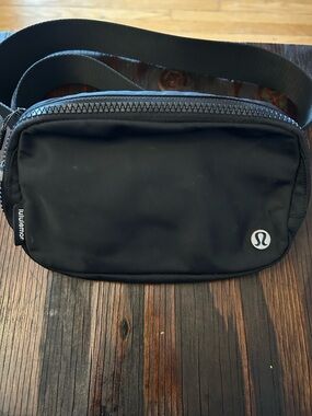 lululemon athletica Black Mini Belt Bag with Silver Logo
